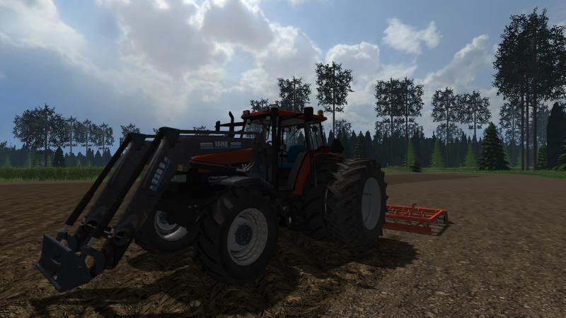 New Holland M135 ja äes.
Maan muokkausta.
