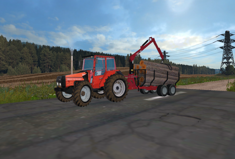 Valmetilla puun ajoa
Valmet 705 ja patu
