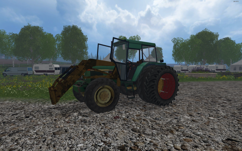 John Deere 3030
Nappipareilla, piilotettavalla etukuormaajalla , ja aukeavilla ovilla.
